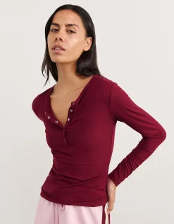 CELINA HENLEY LONG SLEEVE TOP