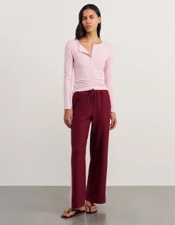 CELINA HENLEY LONG SLEEVE TOP