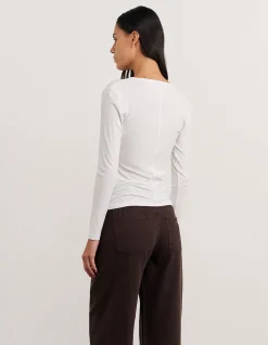 CELINA HENLEY LONG SLEEVE TOP
