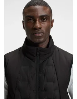Down-filled gilet with welded-logo pattern