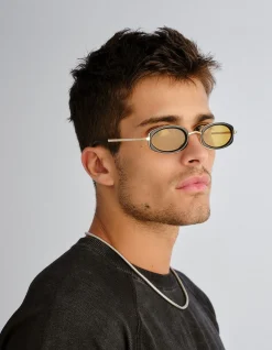 MECHARO BLACK OVAL AMBER TINT SUNGLASSES