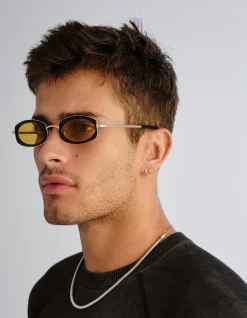 MECHARO BLACK OVAL AMBER TINT SUNGLASSES
