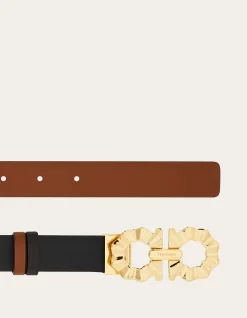 REVERSIBLE AND ADJUSTABLE BELT WITH SHAPED GANCINI