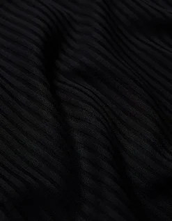 RIBBED ROLL NECK TOP