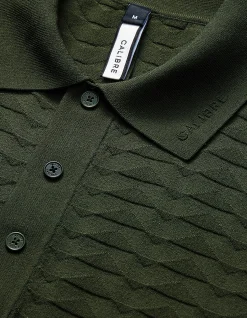 TRIANGLE KNIT POLO